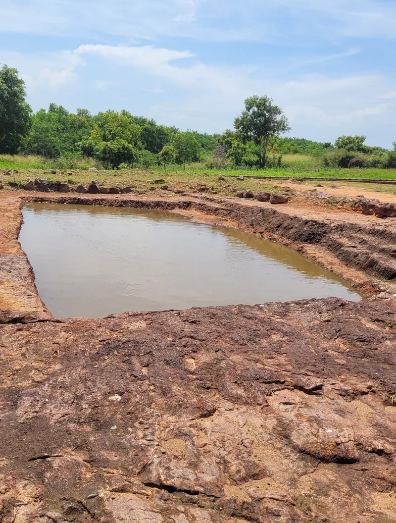 Ancient rock-cut cisterns at the Thotlakonda Buddhist archaeological site